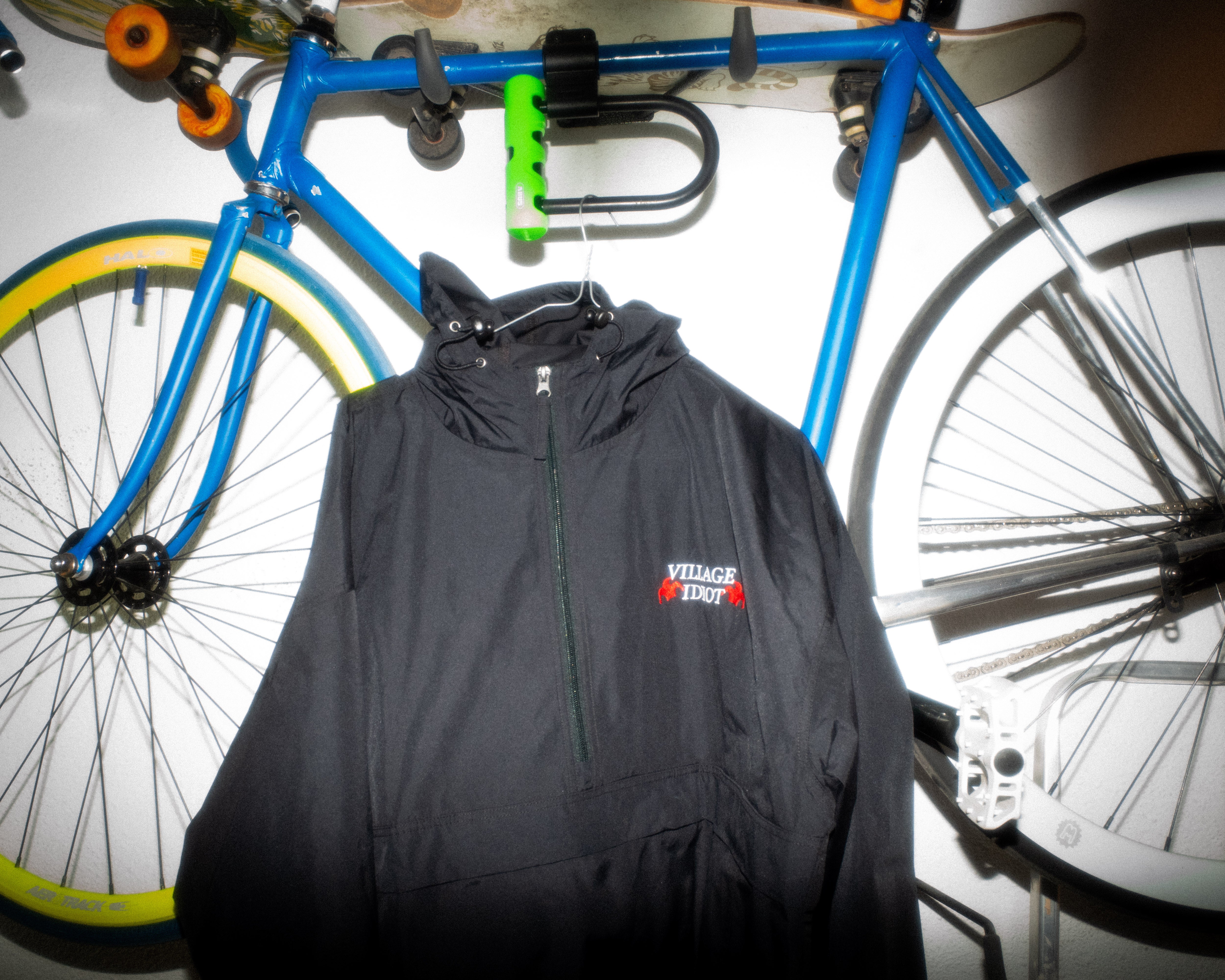 village idiot – embroidered packable jacket – dogecore