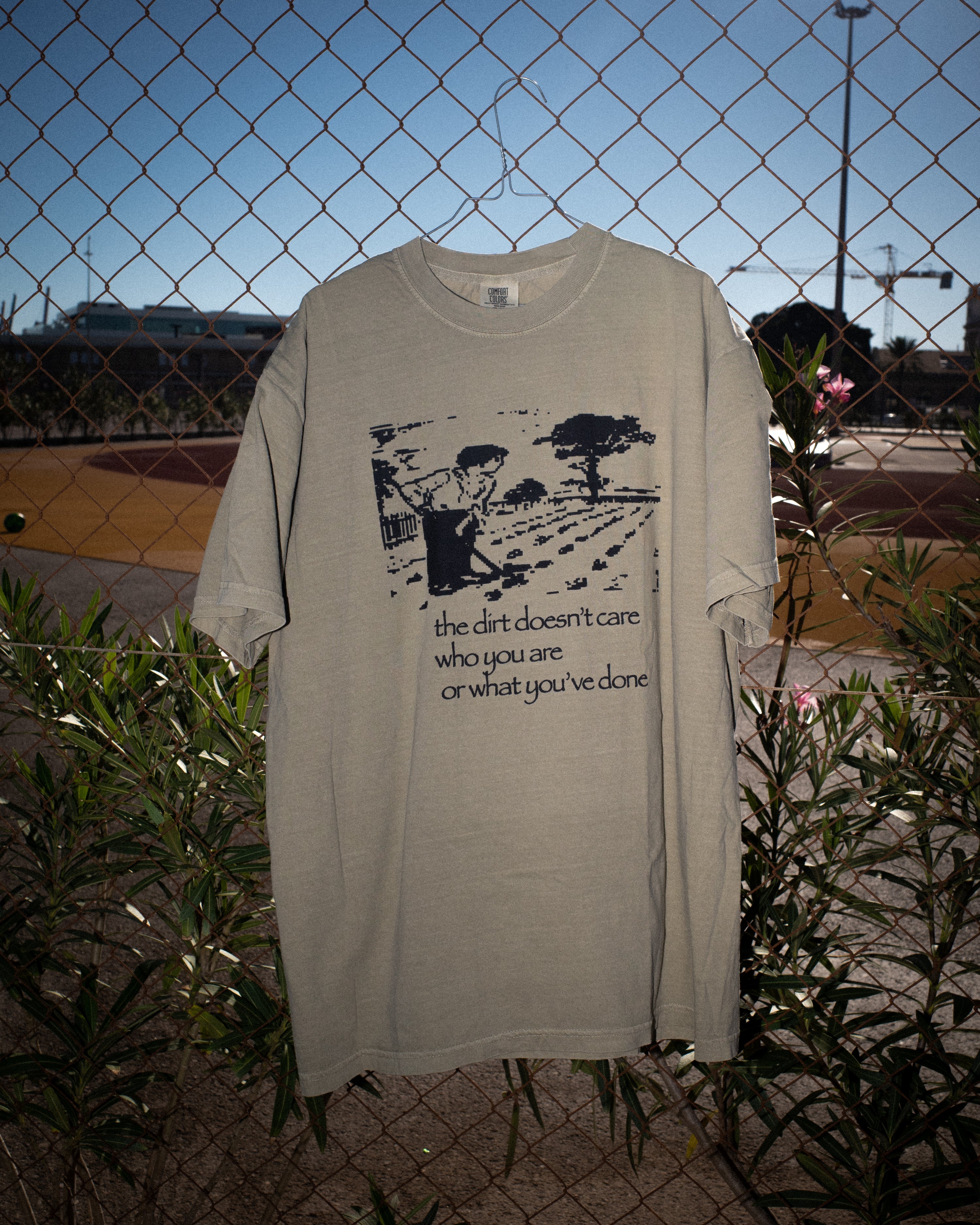 the dirt doesn't care - t-shirt